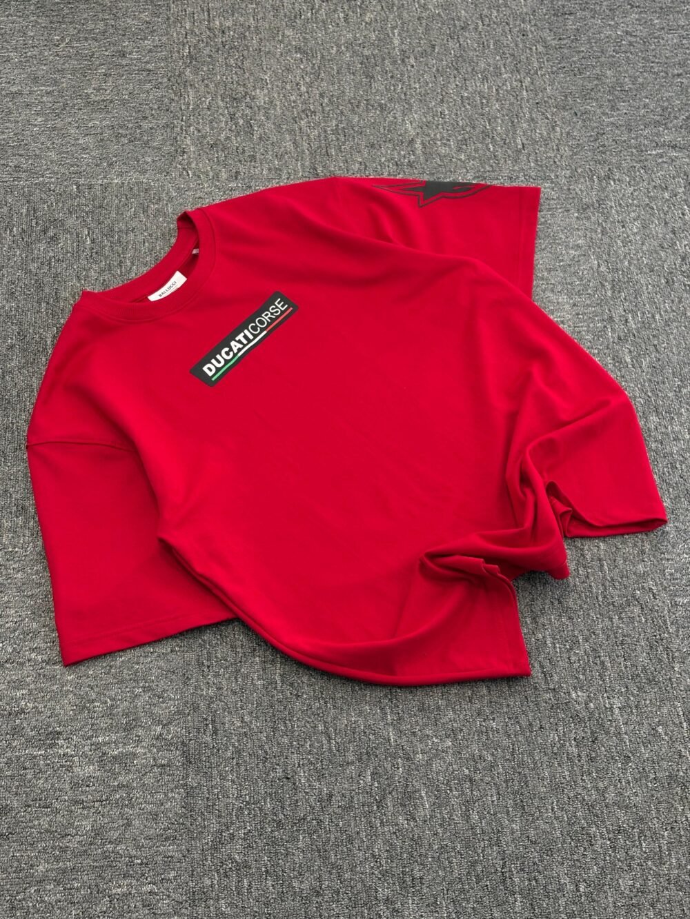 Red Ducati Racing Oversized T-Shirt Featuring Rider Illustration and Alpinestars Logo - Image 2
